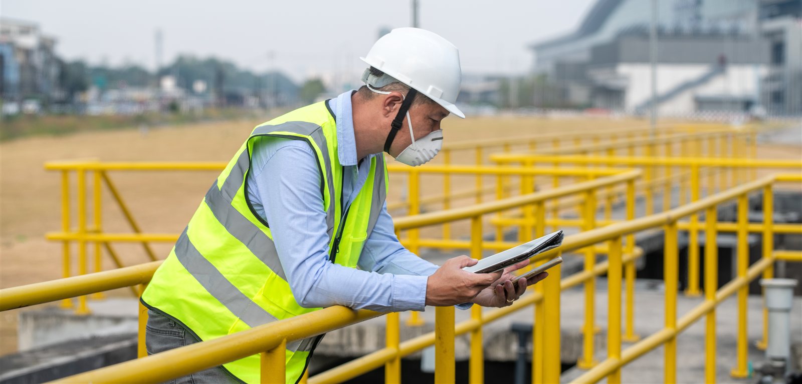 Technically competent manager inspecting a permitted waste transfer site